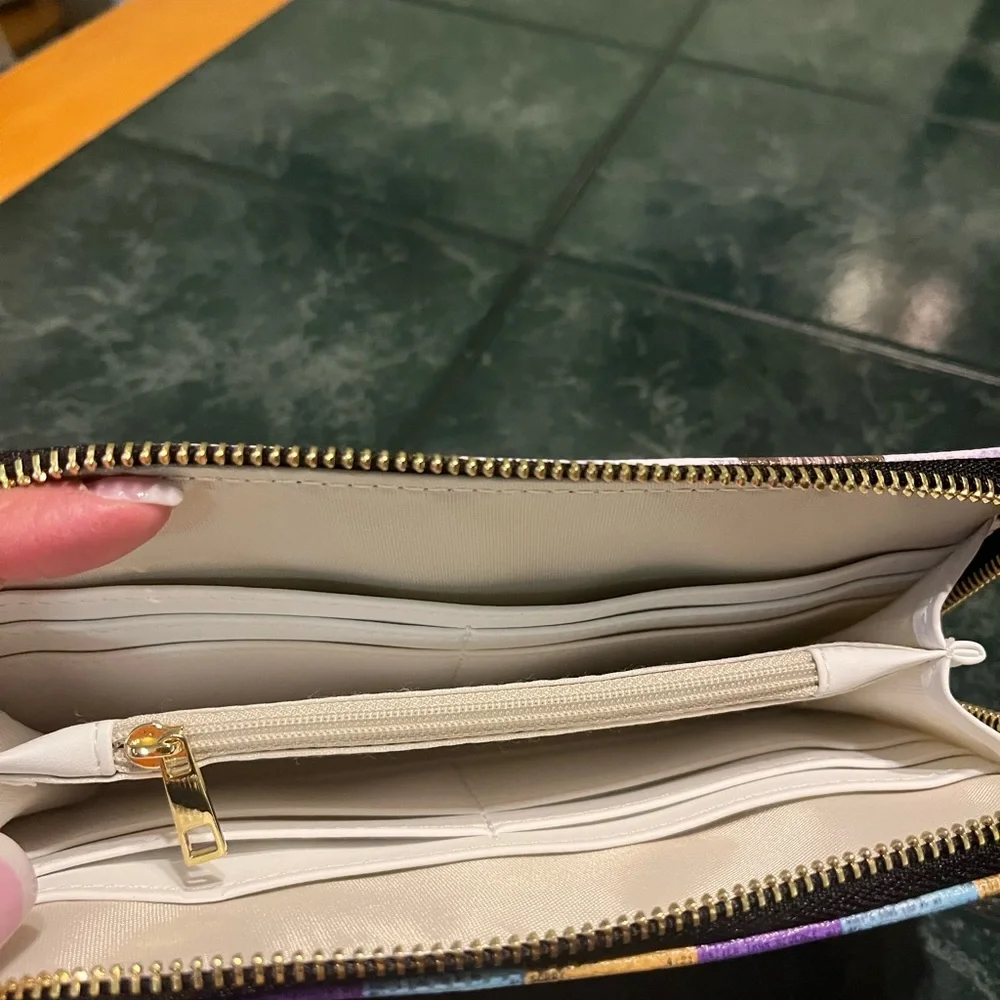 Taylor swift themed wallet.  Never used